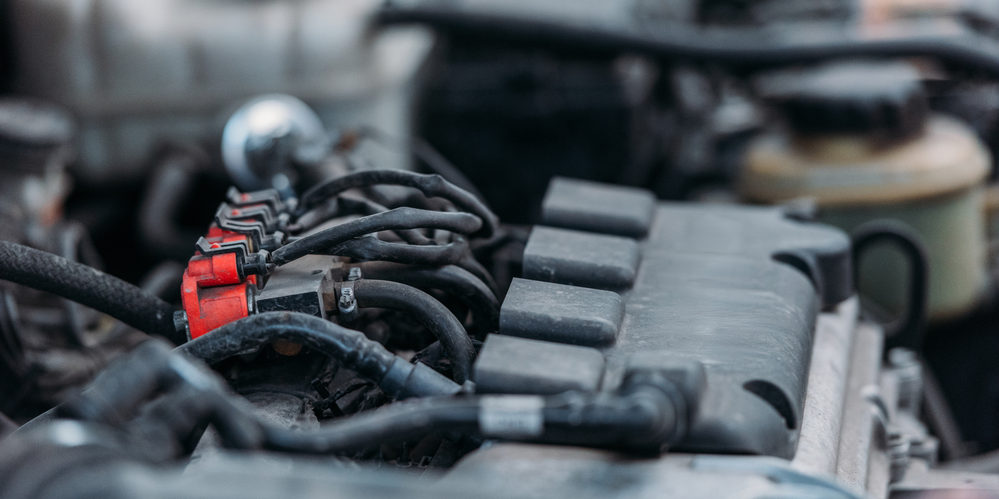 auto repair services mechanic working on car